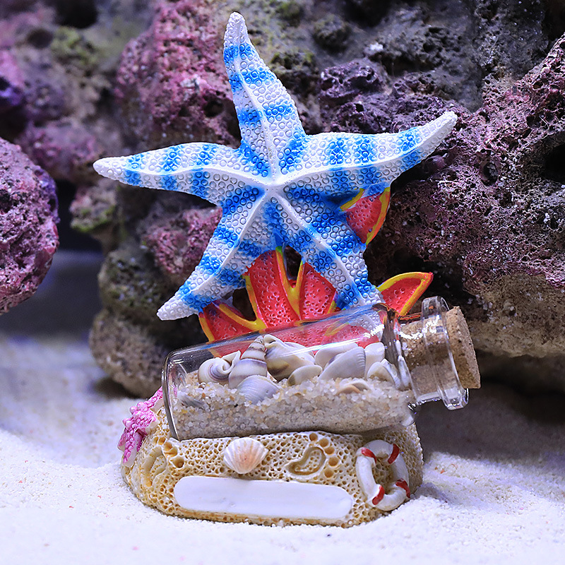 زينة حوض السمك على شكل سمكة مه - مراجعة Marine Aquarium Epoxy وسعره